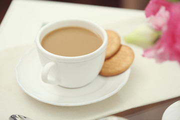Cup of coffee on table close up
