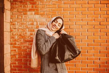 girl in a coat on the street