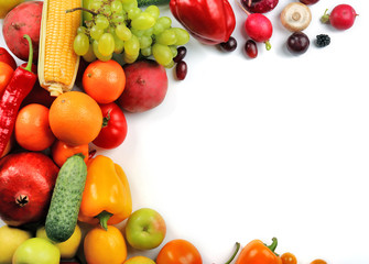 Heap of fruits and vegetables isolated on white