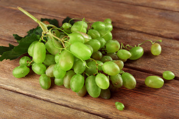 Bunch of white grape on wooden  background