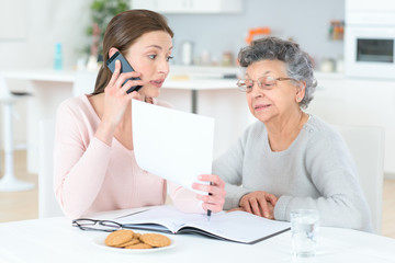 Helping senior lady with her finances