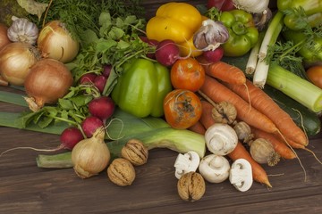 Various types of vegetables on an old wooden table. The concept of diet food. Food for obese patients. Autumn harvest vegetables. Growing fresh home-grown vegetables
