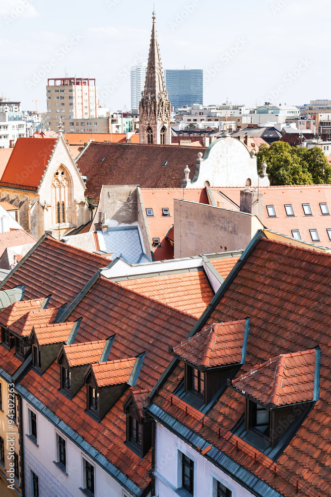 Wall mural above view of orange tile roofs in old town