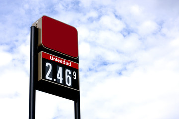 tall red sign displaying fuel price in white letters