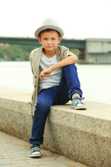 Little boy on the riverside