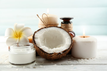Fototapeta na wymiar Spa coconut products on light wooden background
