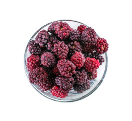 Frozen domestic red blackberries - isolated on white background