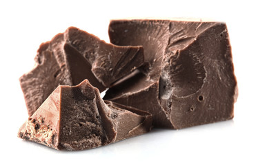 Milk chocolate pieces isolated on white