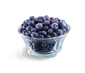 Bowl of frozen domestic blueberries isolated on white backgound