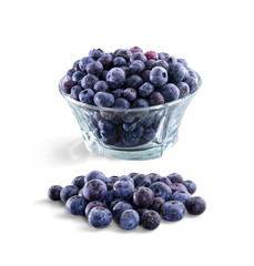 Bowl of frozen domestic blueberries isolated on white backgound
