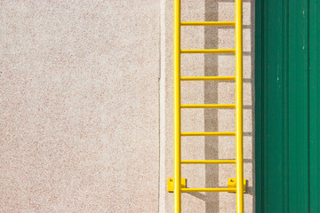 Yellow ladder with space for text.