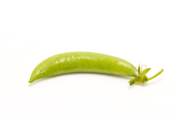 Green peas isolated on white.