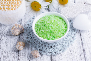 Spa salon with sea salt and daisy