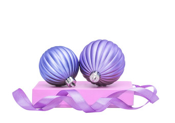 Lilac Christmas and New Year baubles balls, pink gift and ribbon decoration isolated on white background
