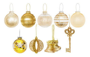 Golden Christmas New Year baubles for Christmas tree, pine, spruce, balls, key, bells isolated on white