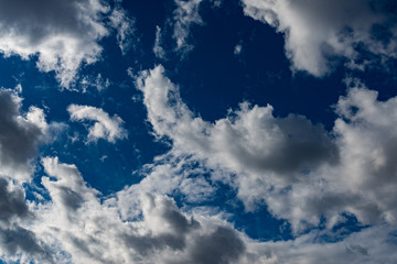 Blue sky with white clouds.