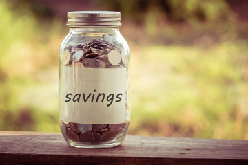 save money for investment concept money in the glass with filter effect retro vintage style