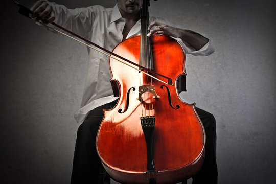 Musician playing a violoncello