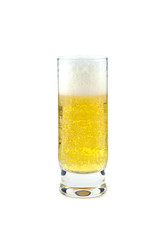 High transparent glass full of cold beer isolated on white closeup. Vertical view
