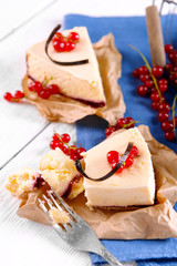Tasty cheesecake with berries on table close up