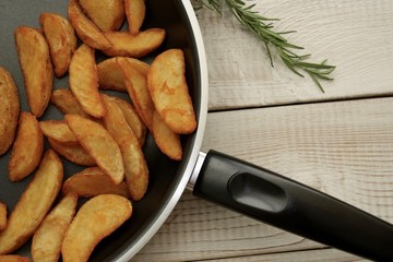 Roasted potatoes in a frying pan