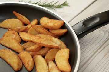 Roasted potatoes in a frying pan