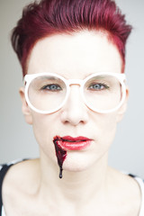 Obraz premium portrait of woman with bloody mouth