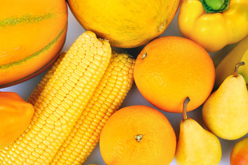 Yellow fruit and vegetables background