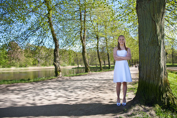 Girl the day of the confirmation standing