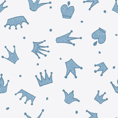 Cute hand drawn blue seamless pattern with crowns for little prince. Can be used to design children's clothing, birthday invitation. Vector illustration.