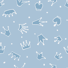 Cute hand drawn blue seamless pattern with crowns for little prince. Can be used to design children's clothing, birthday invitation. Vector illustration.