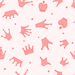 Cute hand drawn pink seamless pattern with crowns for little princess. Can be used to design children's clothing, birthday invitation. Vector illustration.