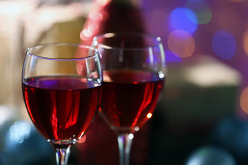 Wine and Christmas decoration on bright background