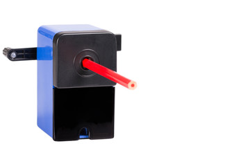 Close-up of a blue sharpener with pencil