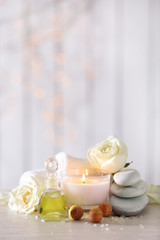 Beautiful composition of spa treatment on wooden table