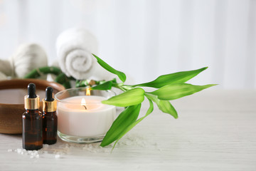 Beautiful composition of spa treatment on wooden table