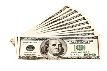A heap of 100 dollar banknotes isolated on white