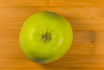 Apple on wooden background