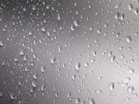 closeup drops of water on the car after rain