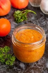 roasted pepper and other vegetables dip with parsley. Vegetarian