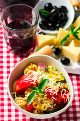 spaghetti with vegetables ,tomatoes and basil