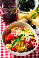spaghetti with vegetables ,tomatoes and basil