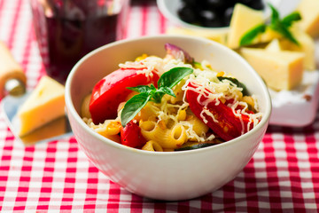 spaghetti with vegetables ,tomatoes and basil