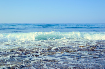 Waves on the sea and blue sky