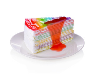 Rainbow crape cake on white plate