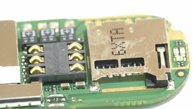 Soldered chips from a USB stick processor. Part of the solid box of the USB has soldered chipsets and transistors