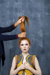 Portrait of the beautiful red haired woman