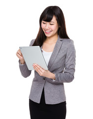 Fototapeta premium Asian Businesswoman use of the tablet pc