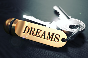 Keys to Dreams. Concept on Golden Keychain.