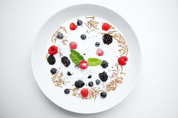 Musli with milk and berries for breakfast